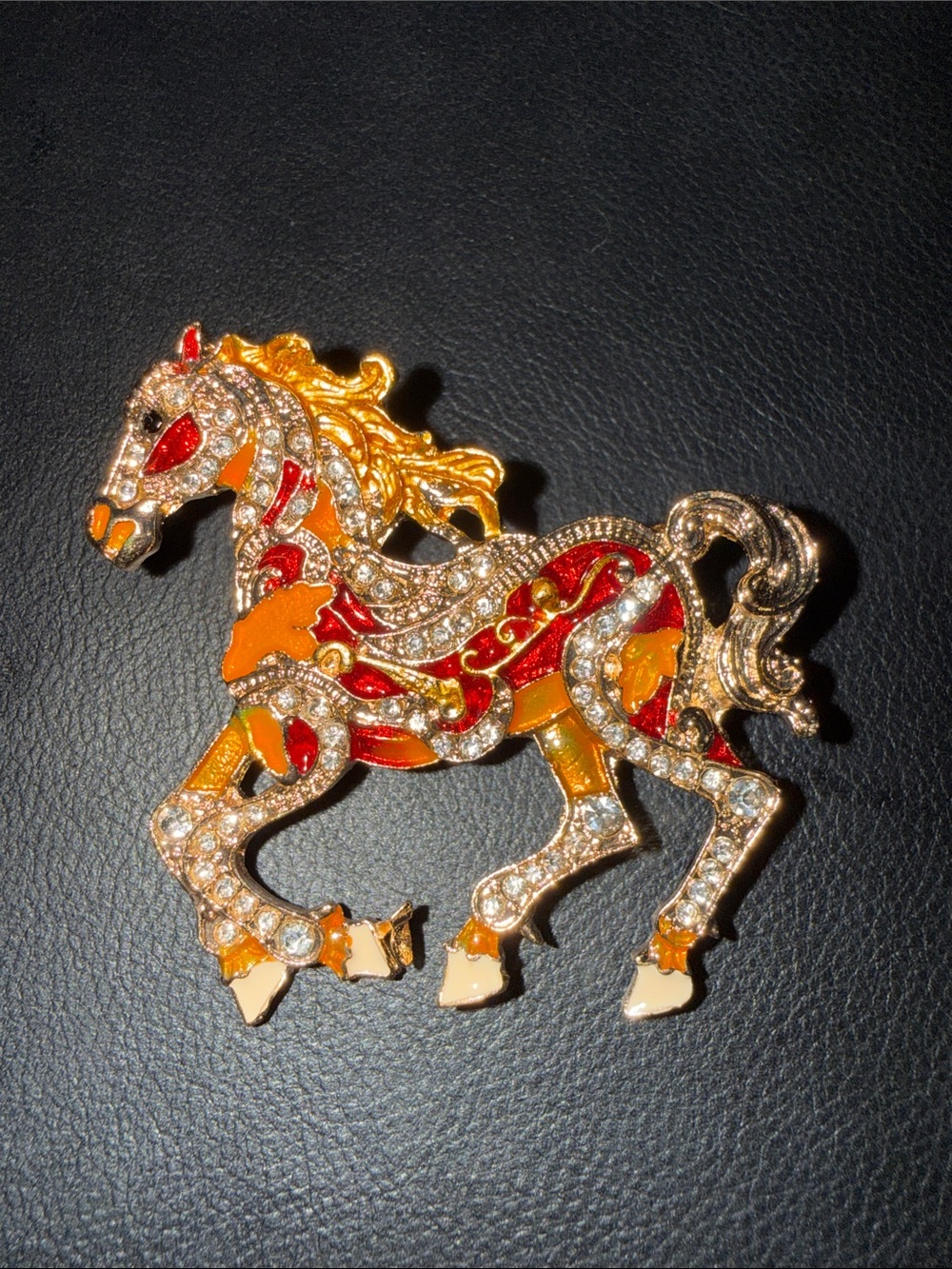 Gold-Tone Red & Orange Horse Brooch with Crystal Accents